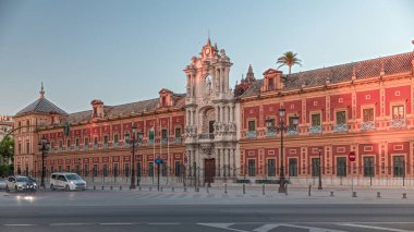 San Telmo Sarayı Seville, İspanya 'da zaman atlaması. Eskiden navigatörler için üniversite, şimdi ise Endülüs Hükümeti 'nin merkezi. Gün batımında süslemeli Barok mimarisi