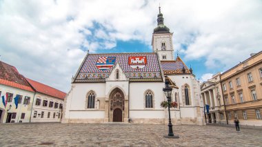 Church of St. Mark timelapse hyperlapse and parliament building in downtown Zagreb, Croatia. Cloudy sky