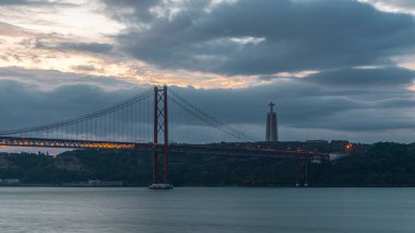Lisbon city before sunrise with April 25 bridge night to day transition timelapse, Cristo Rei and lighthouse early morning