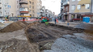 Endüstriyel makine çalışma yapımı sitesi timelapse bina. Buldozer ve vinç yere tramvay parça imar sırasında çalışma