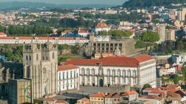 Cathedral of Porto - close up aerial view from Clerigos Tower in Porto timelapse before sunset, Portugal