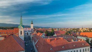 Church of St. Mark timelapse and parliament building Zagreb, Croatia. Top view from Kula Lotrscak tower viewpoint before sunset