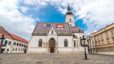 Church of St. Mark timelapse hyperlapse and parliament building in downtown Zagreb, Croatia. Cloudy sky
