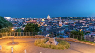 Panoramic cityscape view from the Pincio Landmark day to night transition aerial timelapse in Rome, Italy on a beautiful warm spring evening