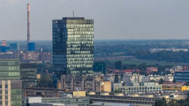 Panorama of the city center timelapse of Zagreb, Croatia, with modern towers and historic buildings, museums in the distance. Top aerial view from skyscraper
