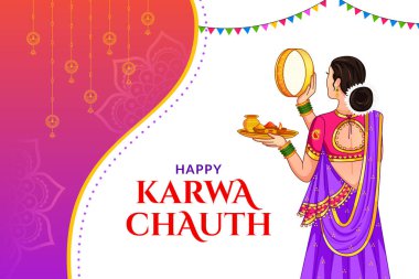 Hindu kadın, Karwa Cahuth 'un elek eşliğinde aya baktığı festival ritüelini gerçekleştiriyor.