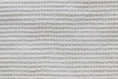 beyaz örgü yünün doku arkaplan deseni.