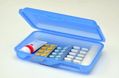 box with different medicines on a white background