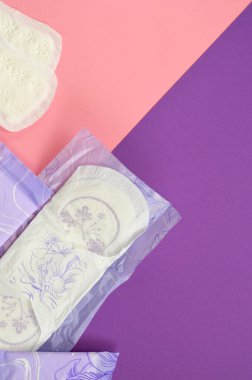menstrual and daily pads on colorful background