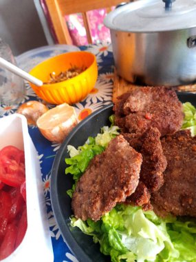 Arjantin 'de yemek hazırlama. Tercihen Arjantinliler, makarna, sos ve birçok çeşni içeren sıcak yemekler hazırlamayı severler..