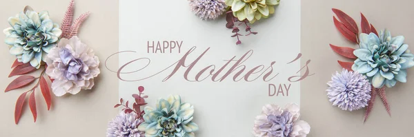 Happy Mother\'s Day Pastel Colored and Muted Earthy Tones Banner. Flat lay floral greeting card with beautiful silk flowers.