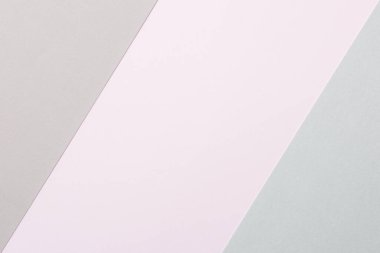 Abstract Pastel and Muted Tones Paper Texture Minimalist Background. Geometrical pale colored paper flat lay background. Minimalism, geometry and symmetry template.