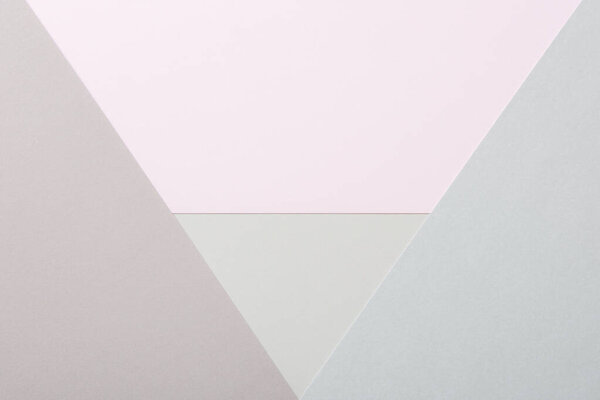 Abstract Pastel and Muted Tones Paper Texture Minimalist Background. Geometrical pale colored paper flat lay background. Minimalism, geometry and symmetry template.