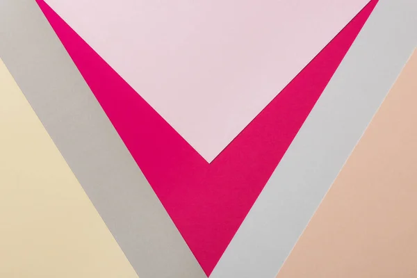 Abstract Viva Magenta and Complementary Colored Paper Textures Minimalist Background. Geometrical multicolored paper flat lay background. Viva Magenta. Minimalism, geometry and symmetry template.