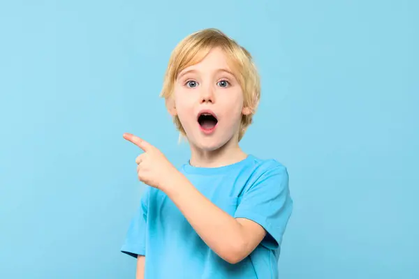 Wow Portrait Shocked Cute Little Boy Blond Hair Pointing Empty — Stock Photo, Image