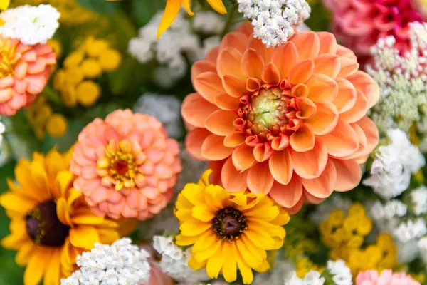 stock image Summer bouquet. Beautiful orange, yellow and white fresh flower arrangement. Birthday or weddding bouquet made of summer flowers close up.