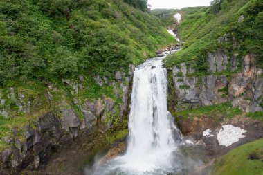 Aerial drone photo of the Calm Waterfall on Kamchatka, Russia clipart
