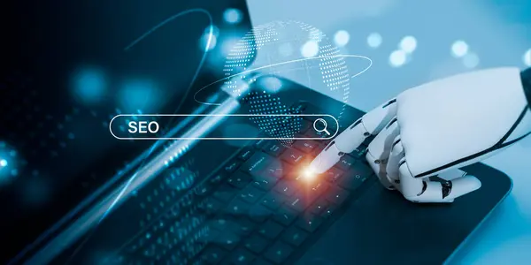 The robot\'s hand signals that you should push the enter key on the laptop\'s keyboard. The idea behind SEO, or search engine optimization, is to optimize your website using artificial intelligence.