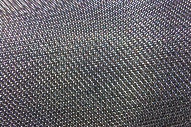 Paslanmaz çelikten ince dokuma yumuşak ışığın altında parıldayan bir yüzey gösteriyor. Karmaşık desenler ortaya çıkarıyor. Işığın etkileşimi sanatsal cazibesini arttırır.