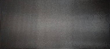 Cut glass texture features a mesmerizing array of geometric patterns, creating a visually stunning effect in a contemporary setting, reflecting light beautifully.