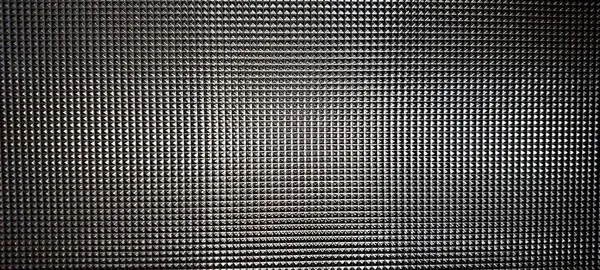 Kesik cam dokusu geometrik desenlerin büyüleyici bir dizilimini içeriyor, çağdaş bir ortamda görsel olarak çarpıcı bir etki yaratıyor, ışığı güzel yansıtıyor..