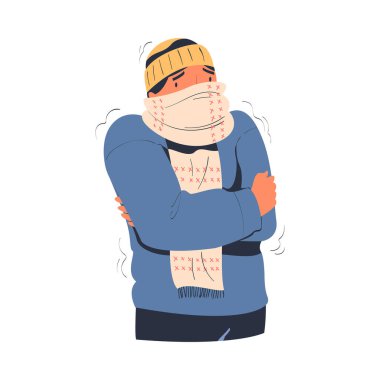 Süveter, eşarp ve şapka giyen adam kış ya da sonbahar sezonunda ısınmaya çalışırken donar.