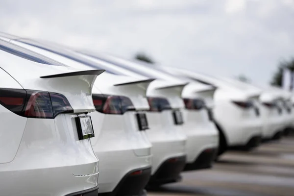 Electric vehicles awaiting preparation for sale