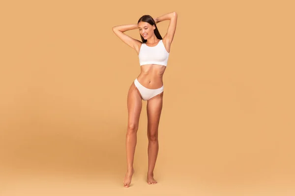Happy Young Woman Fit Body Posing White Underwear Beige Studio — Stock Photo, Image