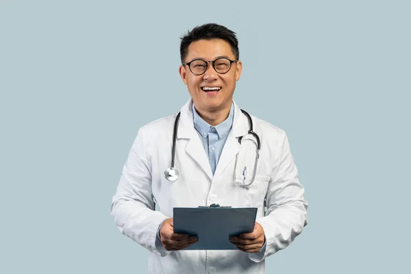 Cheerful Middle Aged Korean Man Doctor White Coat Glasses Tablet — Stock Photo, Image