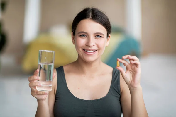 Closeup Portrait Smiling Beautiful Female Holding Vitamin Capsule Glass Water — Stock Photo, Image