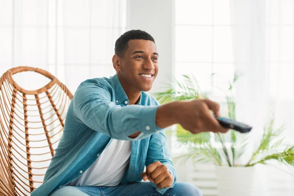 Smiling Millennial African American Guy Remote Control Switches Enjoy Spare — Stock Photo, Image