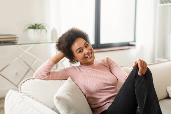 Cheerful Relaxed Young African American Woman Curly Hair Dream Sits — Stock Photo, Image