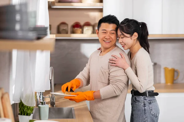Positive Attractive Middle Aged Chinese Man Colorful Gloves Washing Dishes — Stock Photo, Image