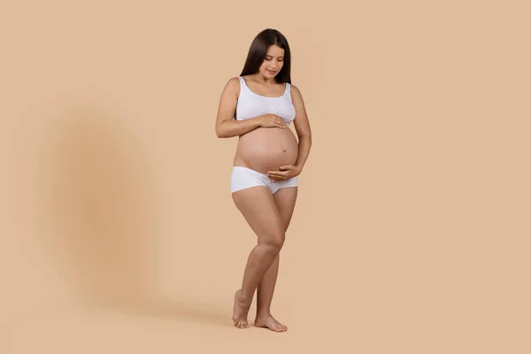 Full Length Shot Young Pregnant Woman Underwear Embracing Belly While — Stok Foto