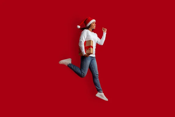 Emotional Beautiful Young Black Woman Wearing Santa Hat Jumping Air — Stock Photo, Image