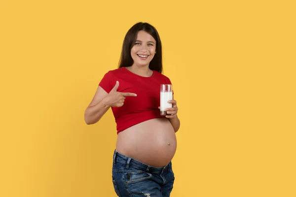 Happy Young Pregnant Woman Pointing Glass Milk Hand Smiling Expectant — Stok Foto