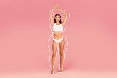 Pembe arka planda duran ve başarılı Weigth Kaybı 'nın ve Collage' ın başarısını gösteren gülümseyen zayıf kadın vücudunun etrafında büyük boy siluet çizilmiş mutlu kadın iç çamaşırları.