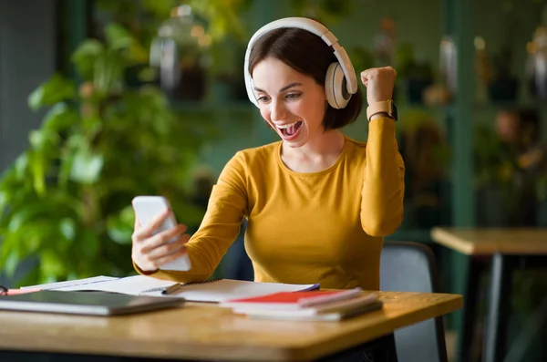 Emotional Young Smiling Woman Using Wireless Headphones Phone Listen Music — Stock Photo, Image