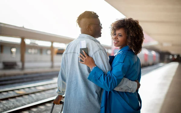 Happy Travellers Portrait Young Black Couple Hugging Railway Station Smiling — Stock Photo, Image