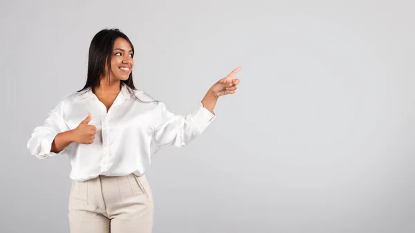 Cheerful Confident Millennial Black Businesswoman White Blouse Point Fingers Empty —  Fotos de Stock