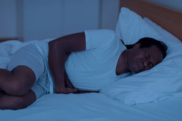 Nocturnal Panic Attack Stressed Black Man Lying Bed Night Feeling — Foto de Stock