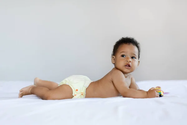 Adorable Black Infant Boy Wearing Reusable Diaper Lying Bed Home —  Fotos de Stock