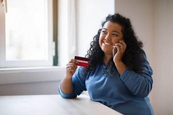 Pretty Curly Hispanic Chubby Woman Looking Number Credit Card Confirm — Fotografia de Stock