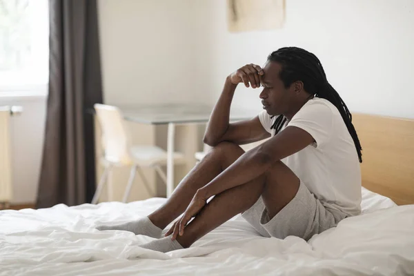 Depression Concept Upset Pensive Black Man Sitting Bed Home Portrait — Stock Fotó