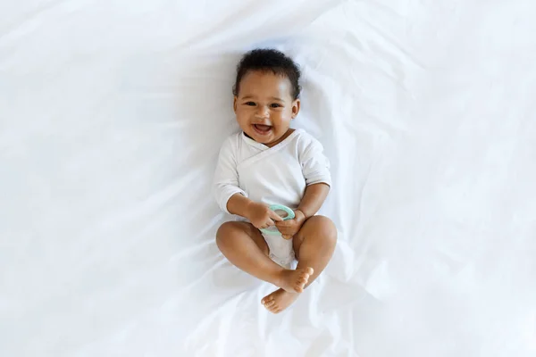 Child Care Concept Top View Adorable Black Infant Boy Relaxing —  Fotos de Stock