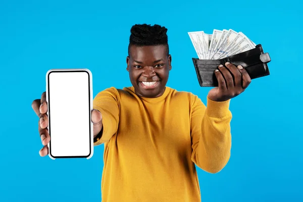 Cheerful Black Male Demonstrating Blank Smartphone Wallet Dollar Cash Money —  Fotos de Stock