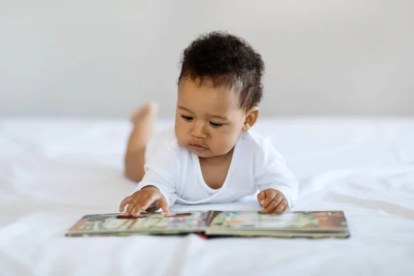 Baby Development Concept Cute Black Infant Child Lying Bed Book —  Fotos de Stock