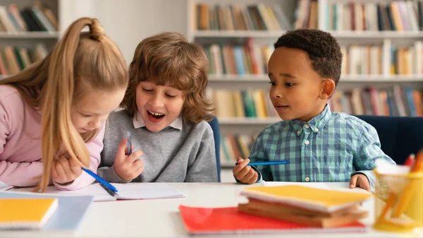 School Time Multiethnic Kids Writing Notebooks Smiling Talking Each Other — Stock Photo, Image