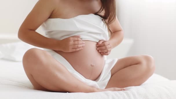 Tenderness Pregnancy Close Shot Unrecognizable Pregnant Woman Wrapped Fabric Caressing — Vídeo de stock