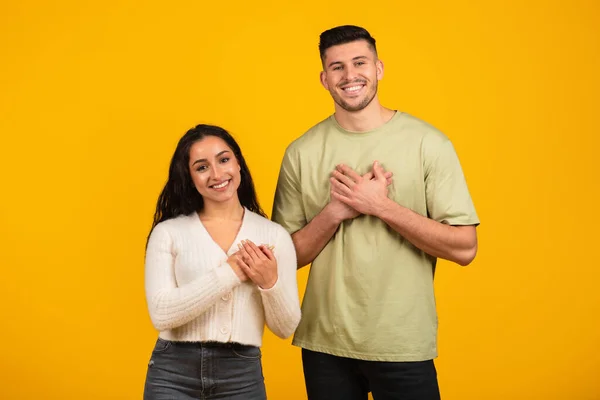 Smiling Millennial Arab Guy Woman Casual Clothes Press Hands Chest — Stock Photo, Image